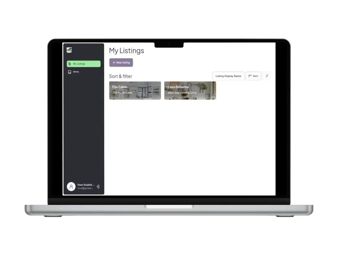 GuideScreen admin dashboard on a laptop browser